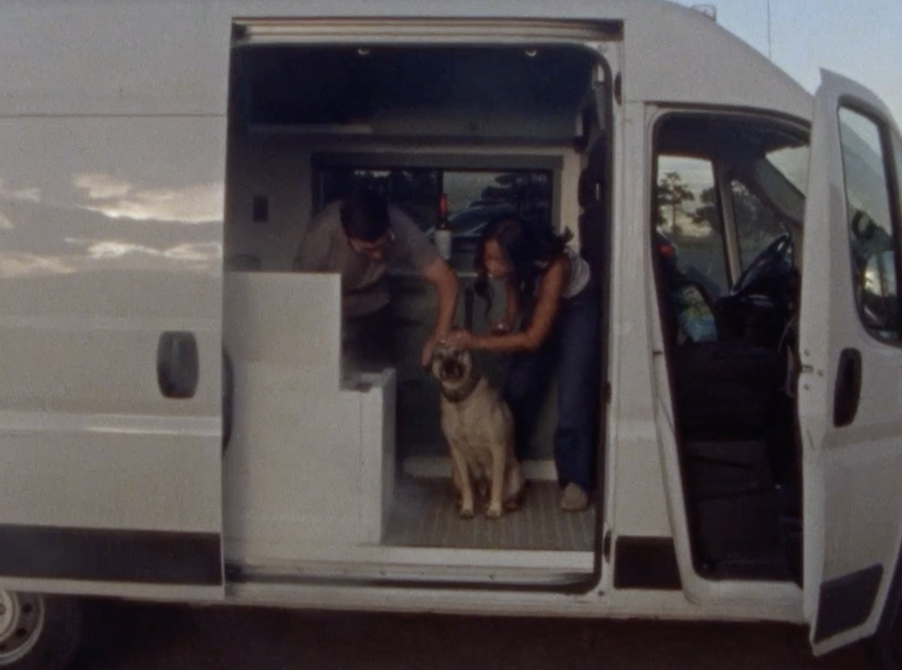 A vanlife couple and their dog filmed on Super 8